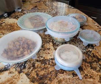 Reviewer image of the circle lids stretched to fit over multiple dishes