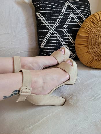 light beige platform heels on reviewer's feet