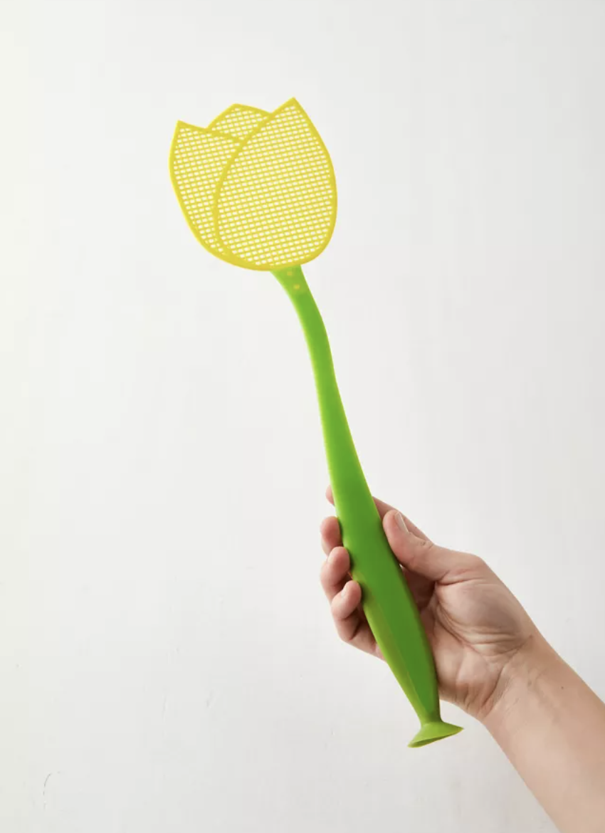 someone wielding a tulip-shaped fly swatter