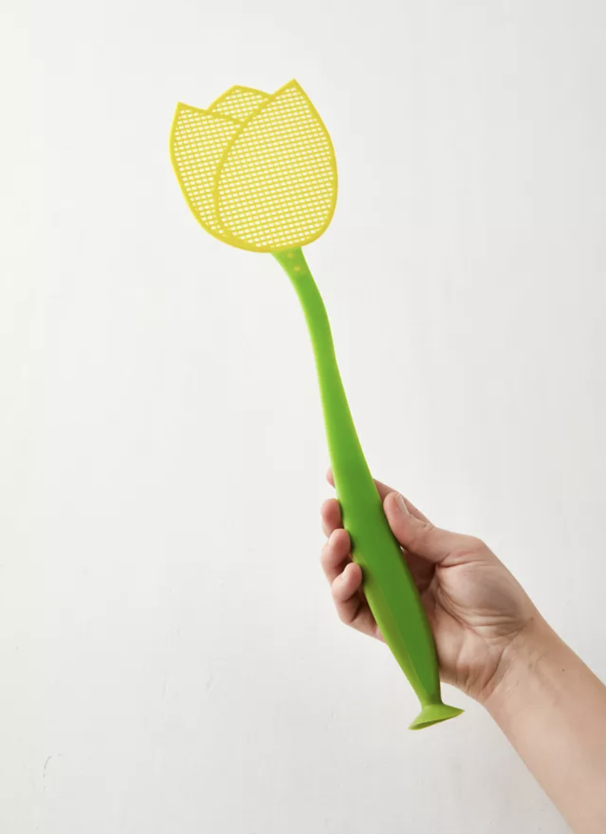 someone wielding a tulip-shaped fly swatter