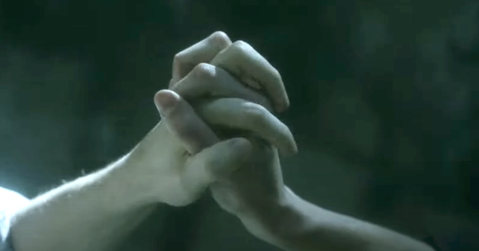 Dumbledore and Grindelwald holding hands