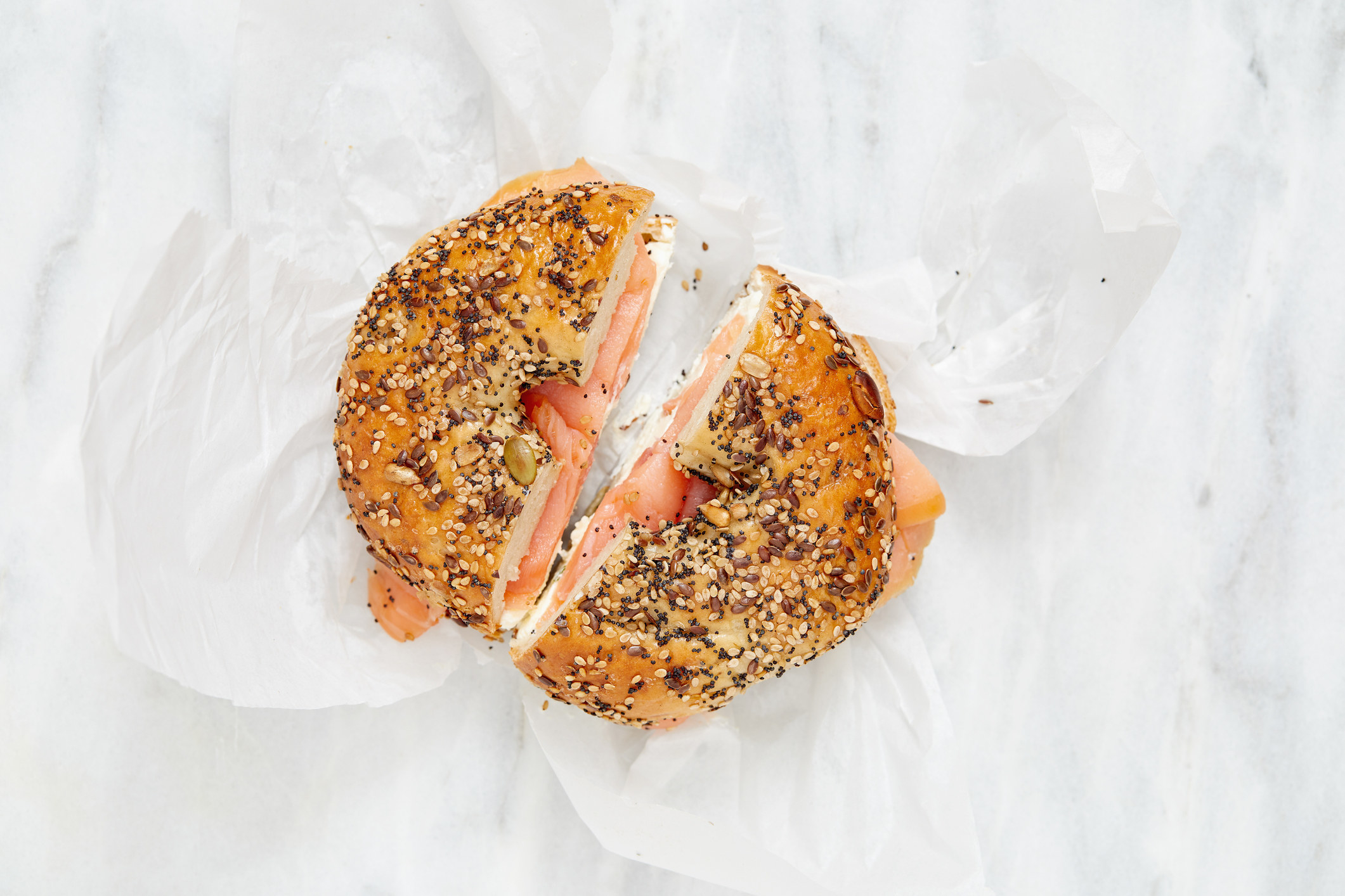 An everything bagel with tomato.