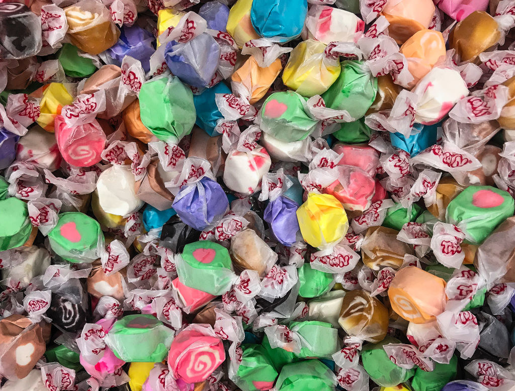 Assorted flavors of salt water taffy.