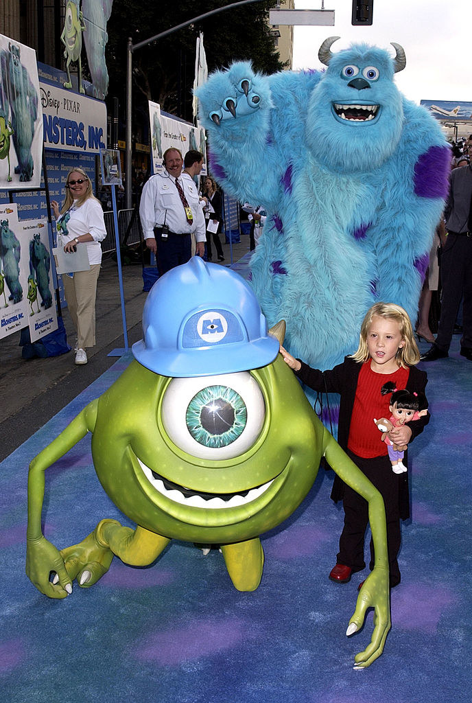 Mary Gibbs with the film&#x27;s characters. during Monsters, Inc. Premiere at El Capitan Theatre