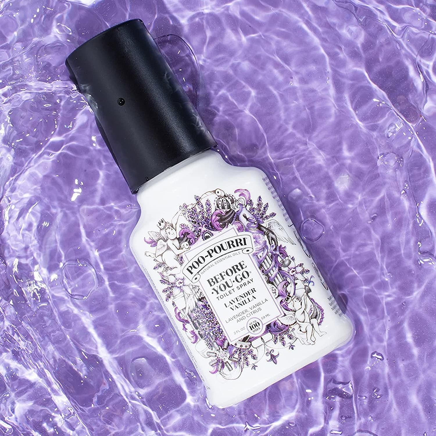 The bottle of Poo-Pourri in a pool of water