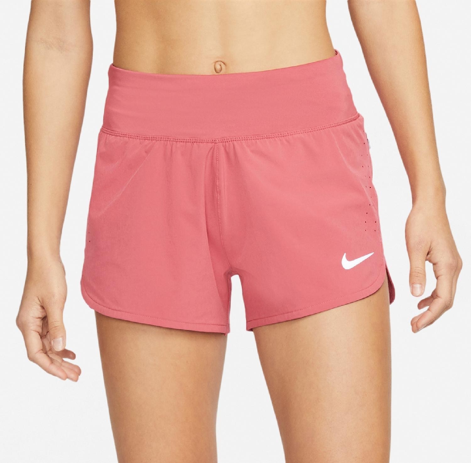 Model side jumping in the purple shorts and a tank