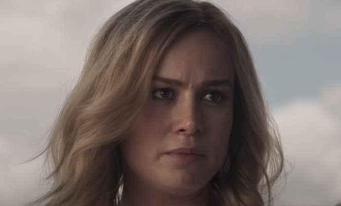 Brie Larson looks off-screen, determined.