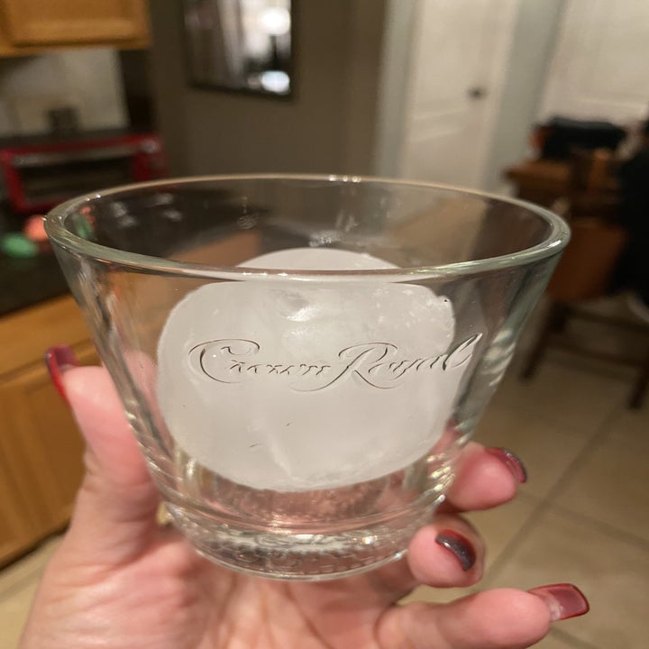 a reviewer's photo of the round ice in their glass