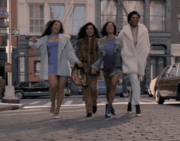 Lulu, Angel, Blanca and Elektra walking down the street happily on TV series Pose