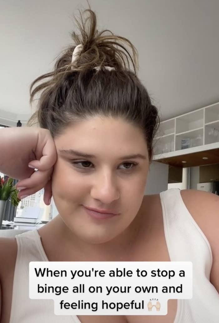 Bader smirking with the caption "When you're able to stop a binge all on your own and feeling hopeful" raised hands emoji