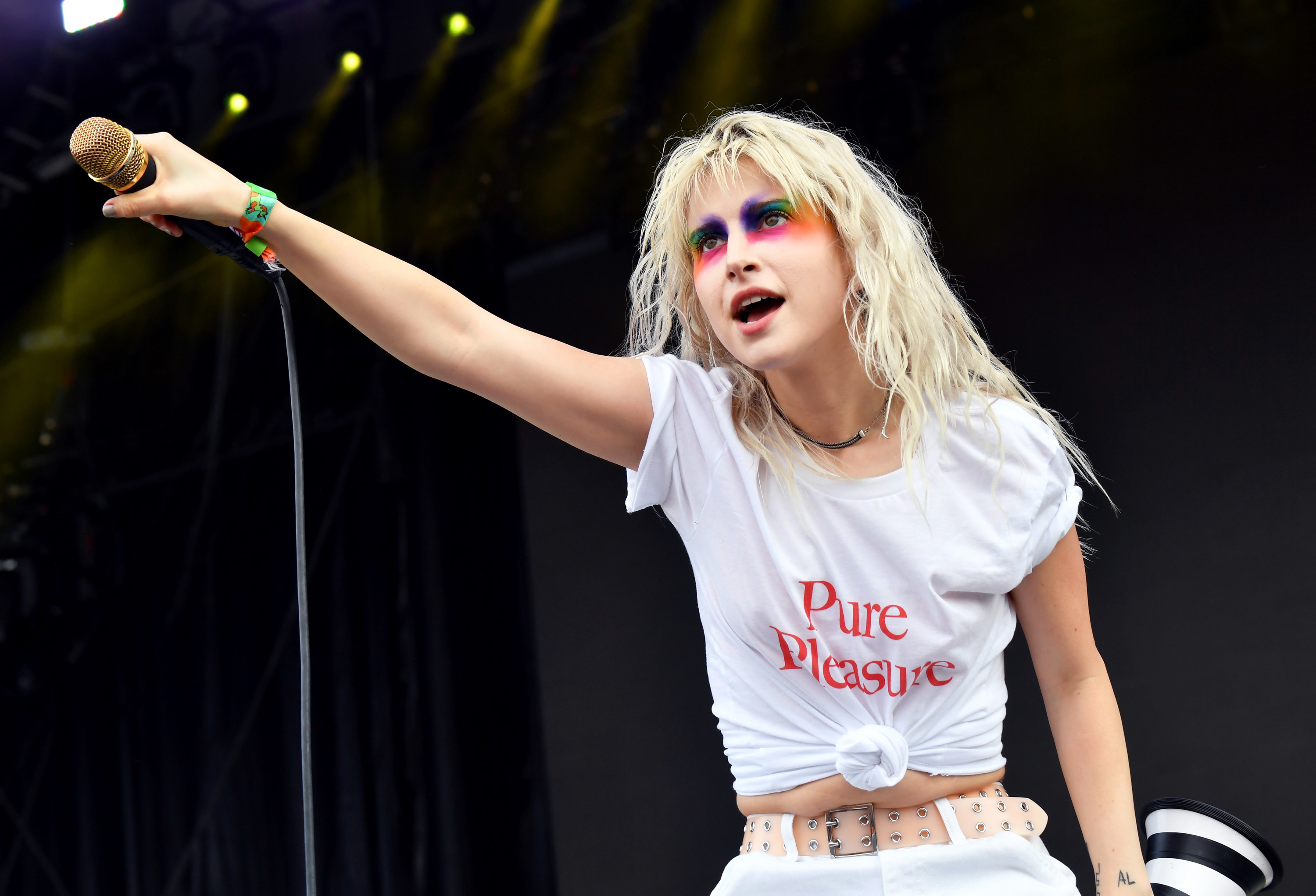 Paramore lead singer Hayley Williams performing with a &quot;Pure Pleasure&quot; T-shirt