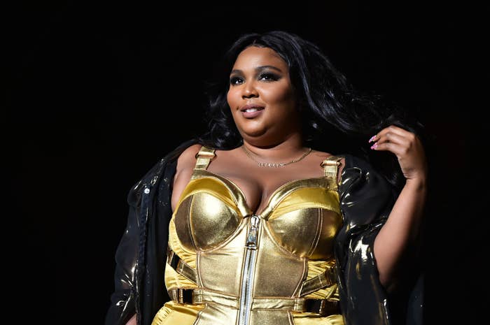 Lizzo in a shiny bustier