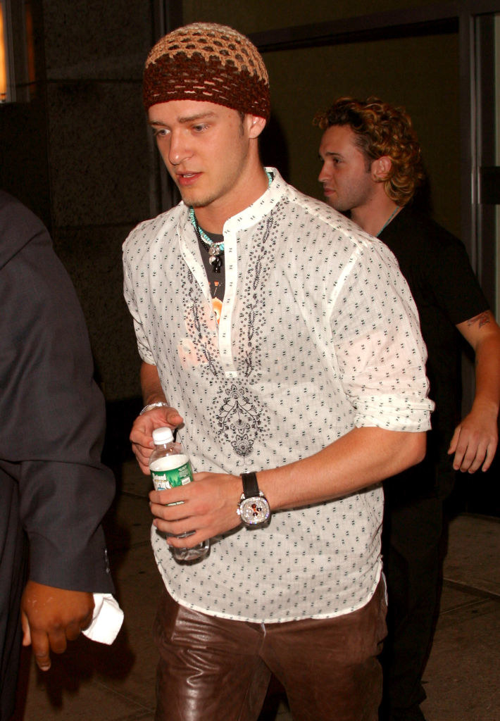 Justin Timberlake in a beanie and holding a bottle of water