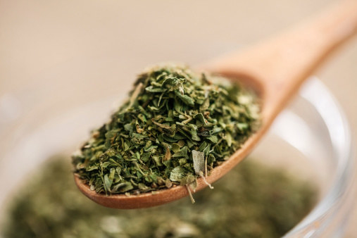 Close-up of dried oregano on a spoon