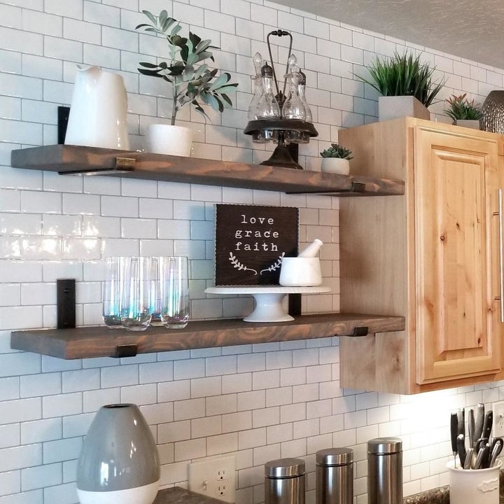the white subway tile on the wall of a kitchen