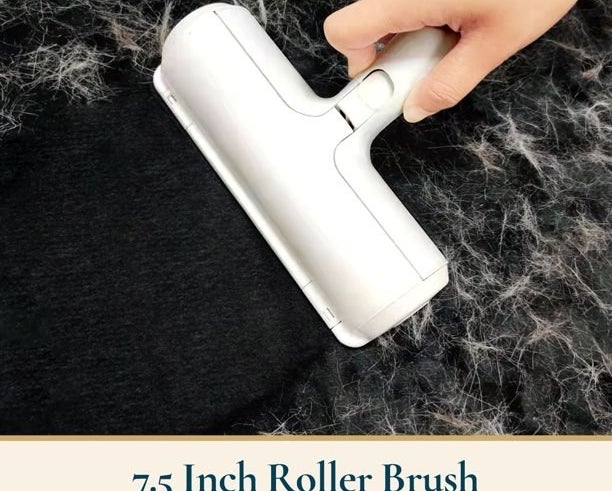 The 7.5 inch roller brush clearing pet hair off a fabric surface with text reading &quot;great for soft surfaces and large areas&quot;