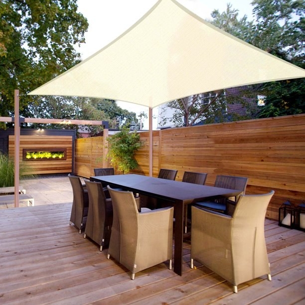the shade over an outdoor dining table