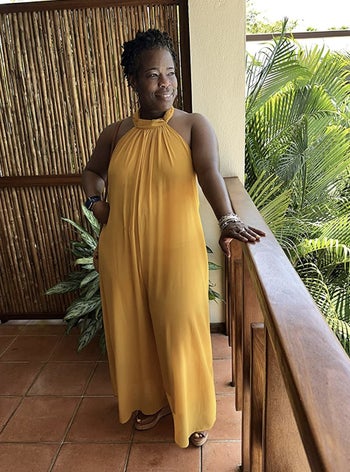 reviewer wearing the jumpsuit