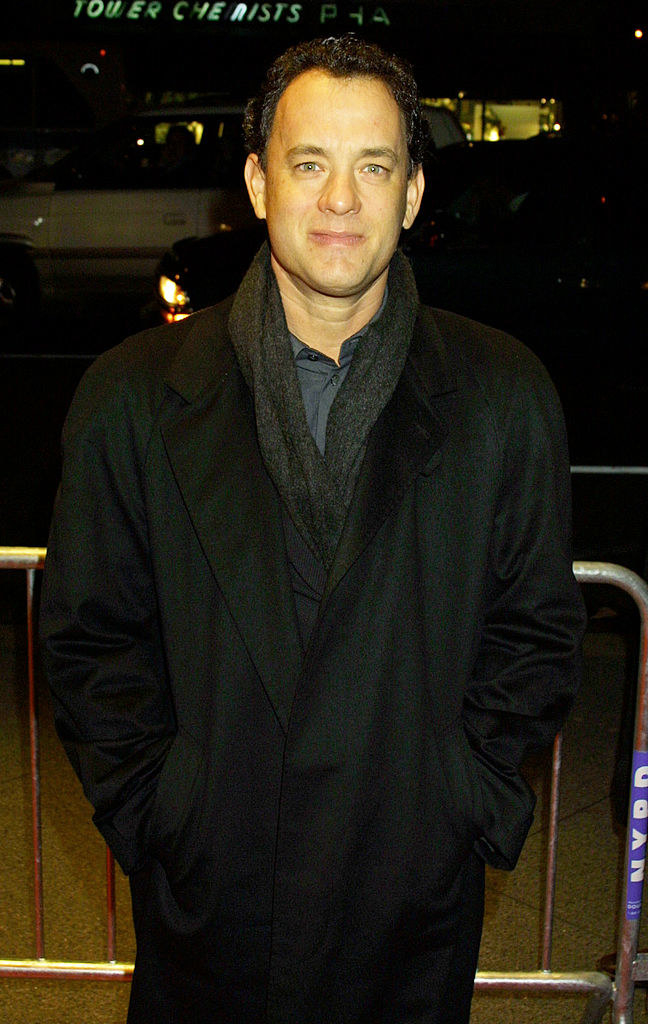 Hanks at the &quot;Cast Away&quot; premiere in a long overcoat and scarf
