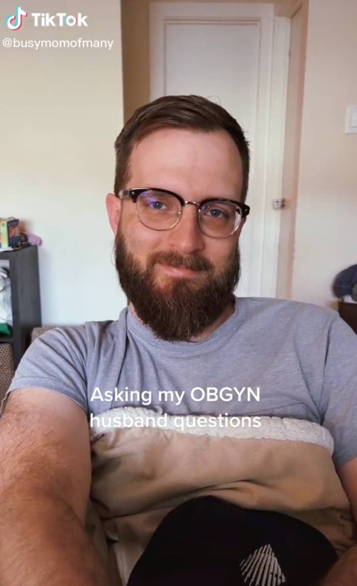 TikTok screenshot of man with the text &quot;Asking my OBGYN husband questions&quot;
