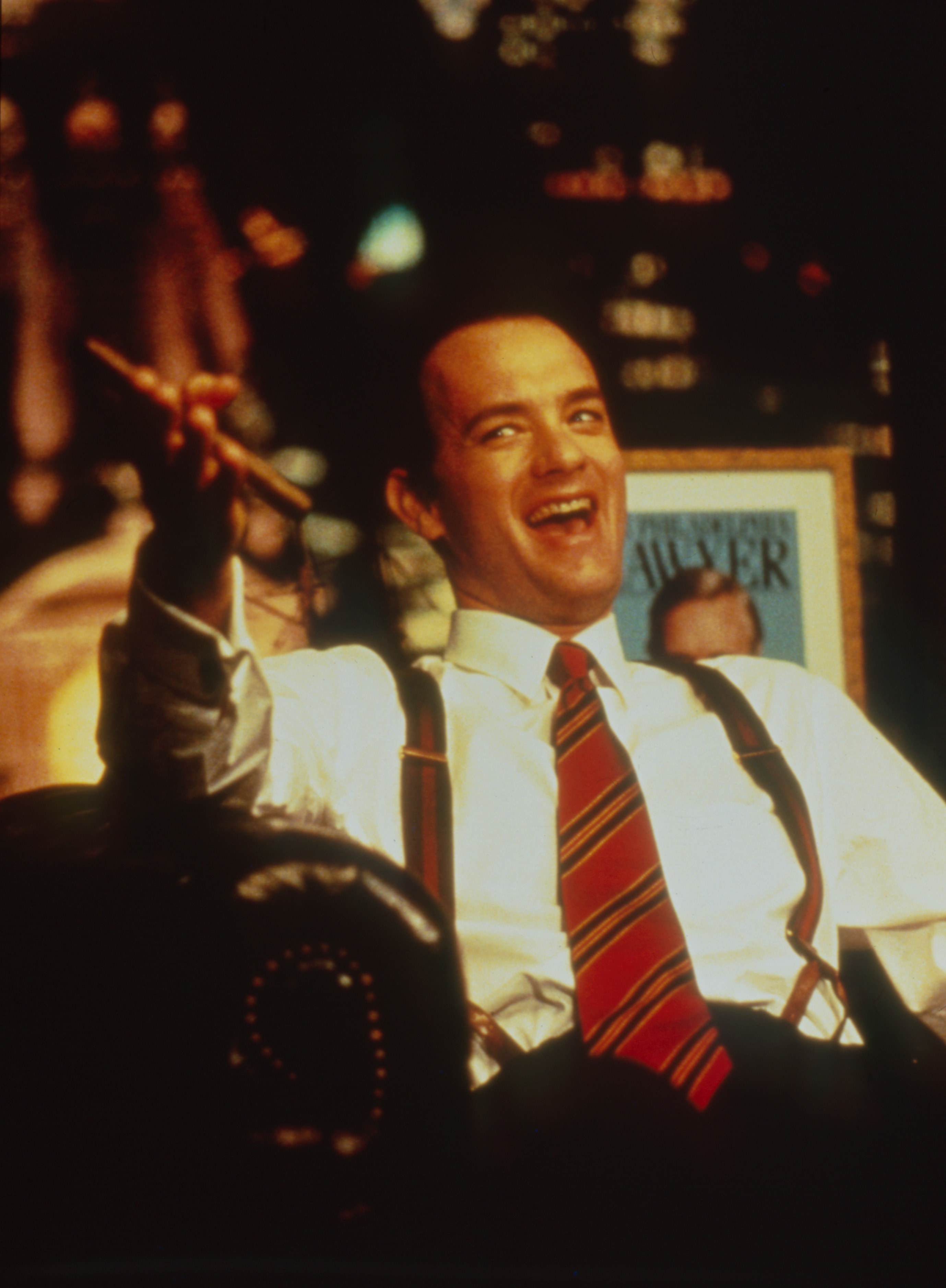 Tom Hanks smiling and pointing a cigar in &quot;Philadelphia&quot;