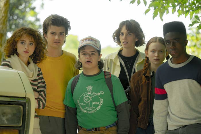 the cast of &quot;Stranger Things&quot; standing outside