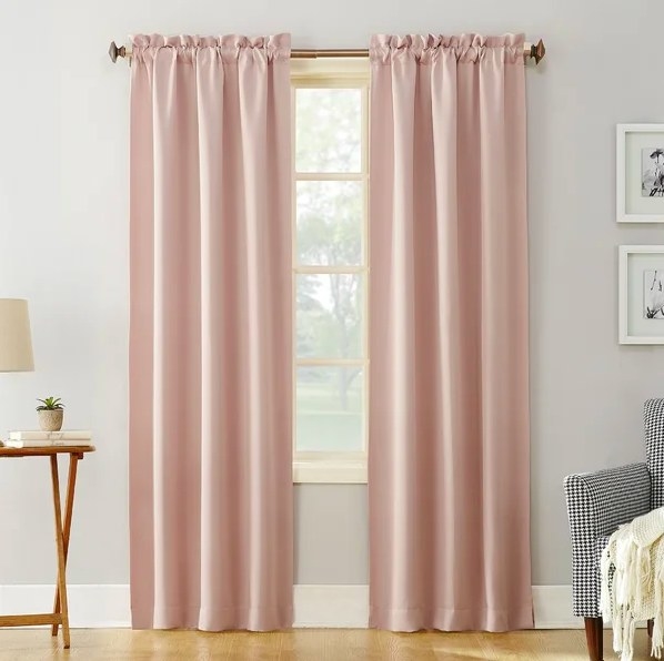 Pink curtain panels on a window