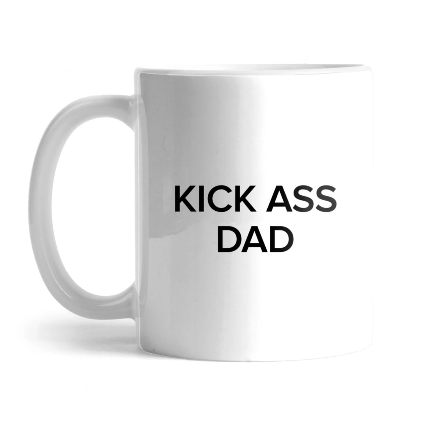 white mug reading &quot;kick ass dad&quot; in black text