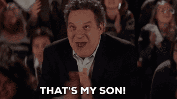 gif of jeff garland in the goldbergs clapping and happily saying &quot;that&#x27;s my son&quot;