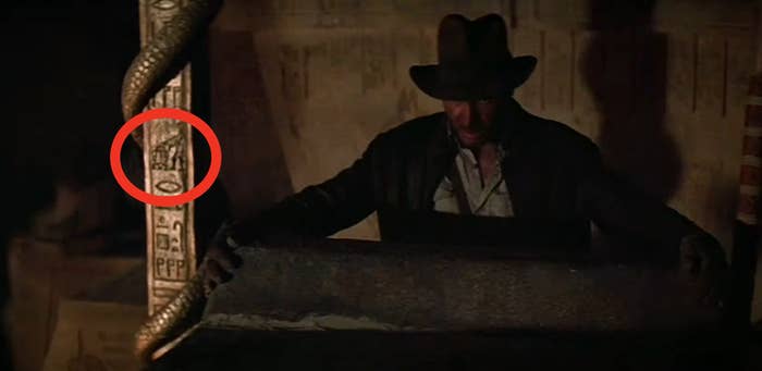 Indiana Jones grabbing the lid for the Ark&#x27;s sarcophagus in &quot;Raiders of the Lost Ark&quot;