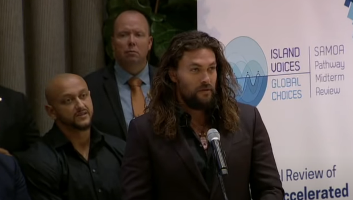 Jason Momoa speaking at an event