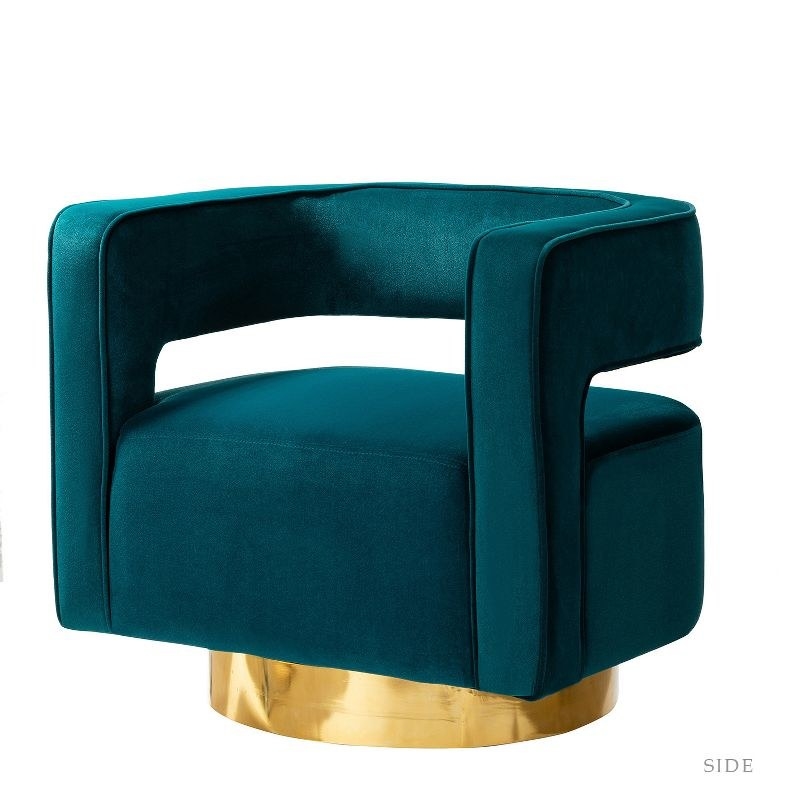a swivel barrel chair in teal and gold