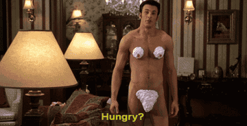 Chris Evans with whipped cream covering his nipples and private parts saying, &quot;Hungry&quot;