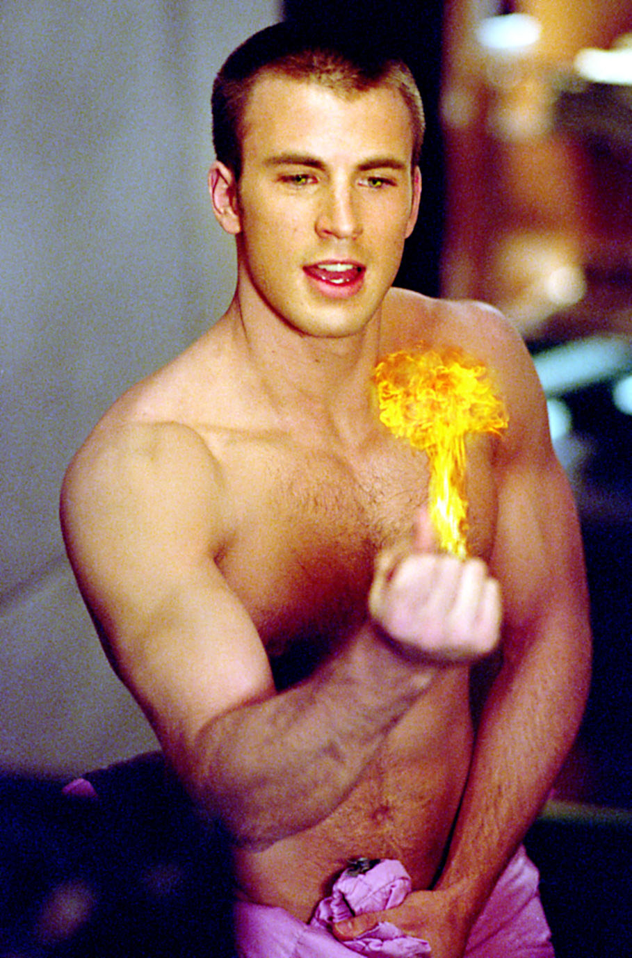 Chris Evans wielding fire in his hands