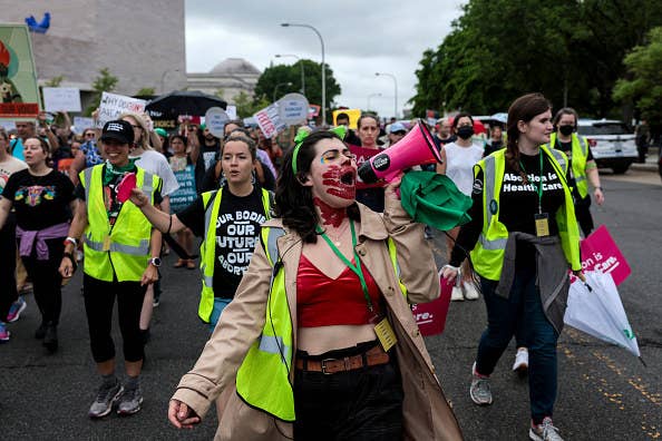 Women marching in a protest to support abortion rights