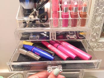 one of the drawers with mascaras inside