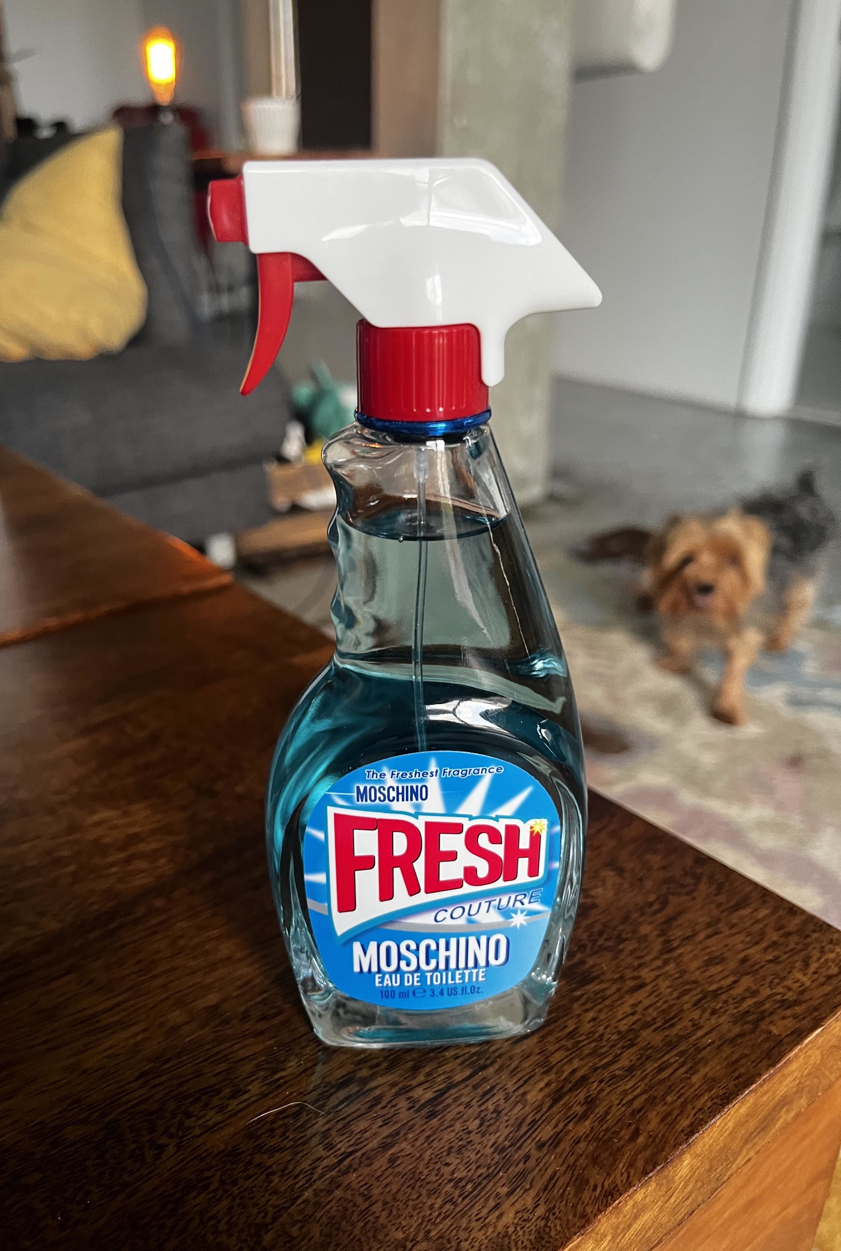 a perfume bottle that looks like glass cleaner