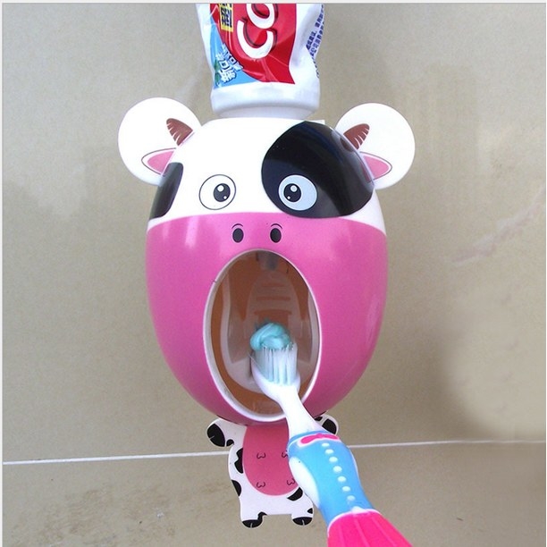 Cow toothpaste dispenser