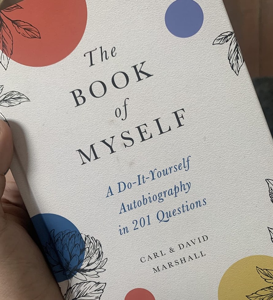 reviewer photo showing the cover of the book