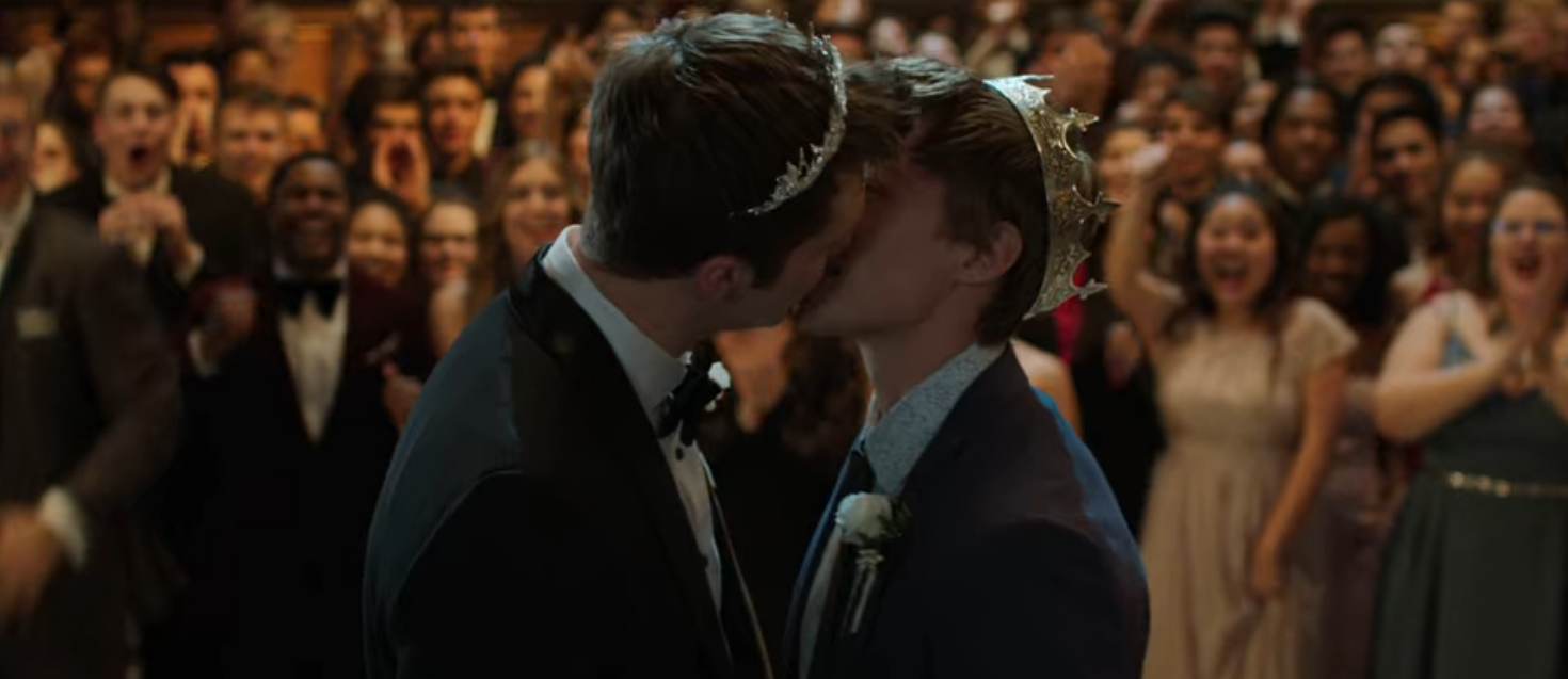 A close up of Alex and Charlie as they kiss after being crowned prom kings