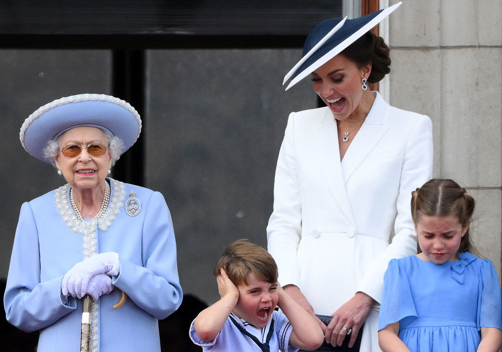 Louis continues screaming, while Kate looks at him and laughs