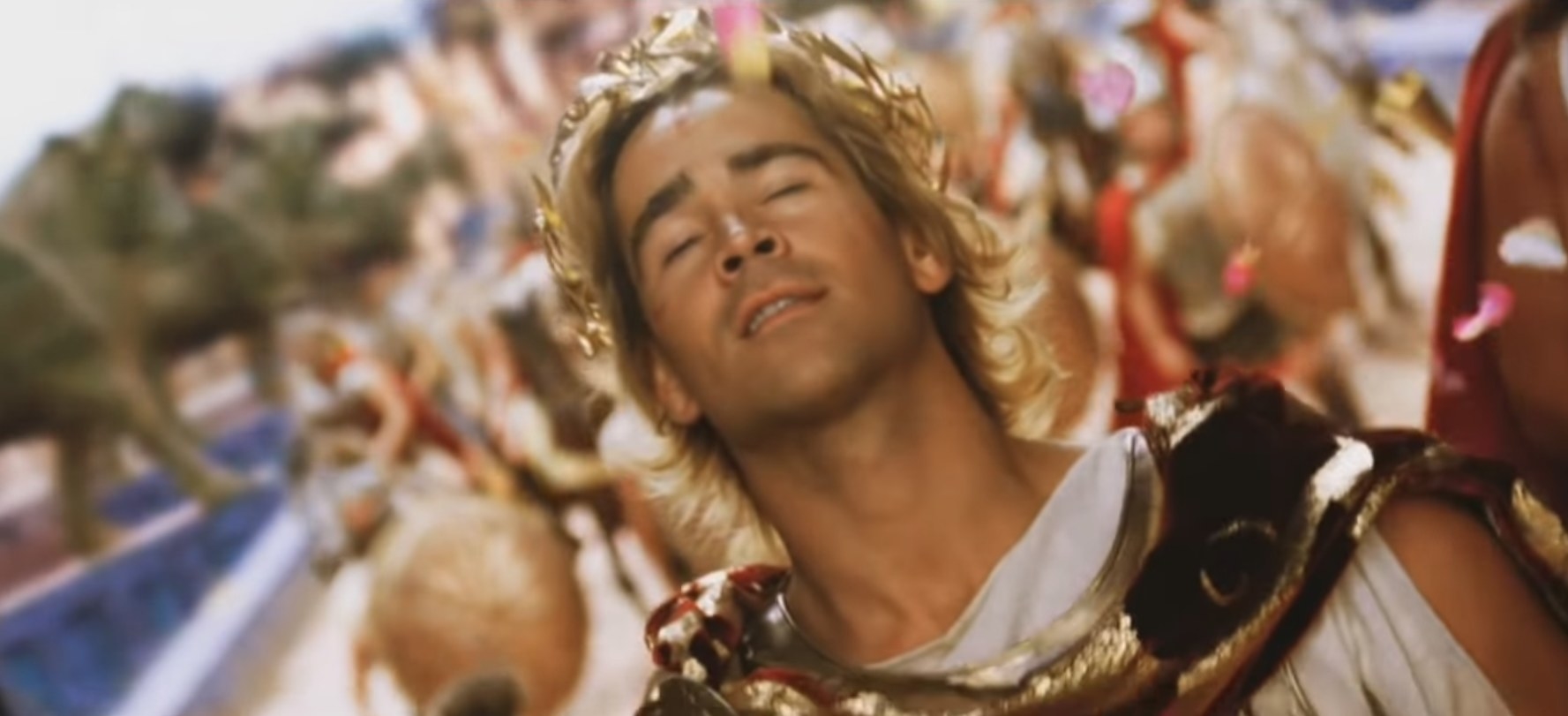 Colin Farrell as Alexander the Great, looking happy in the middle of a parade