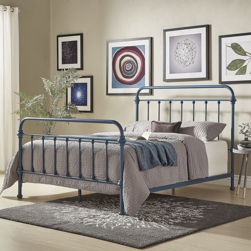 the blue metal frame bed