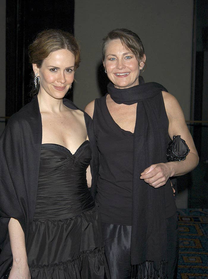 close of the two wearing dresses for the event