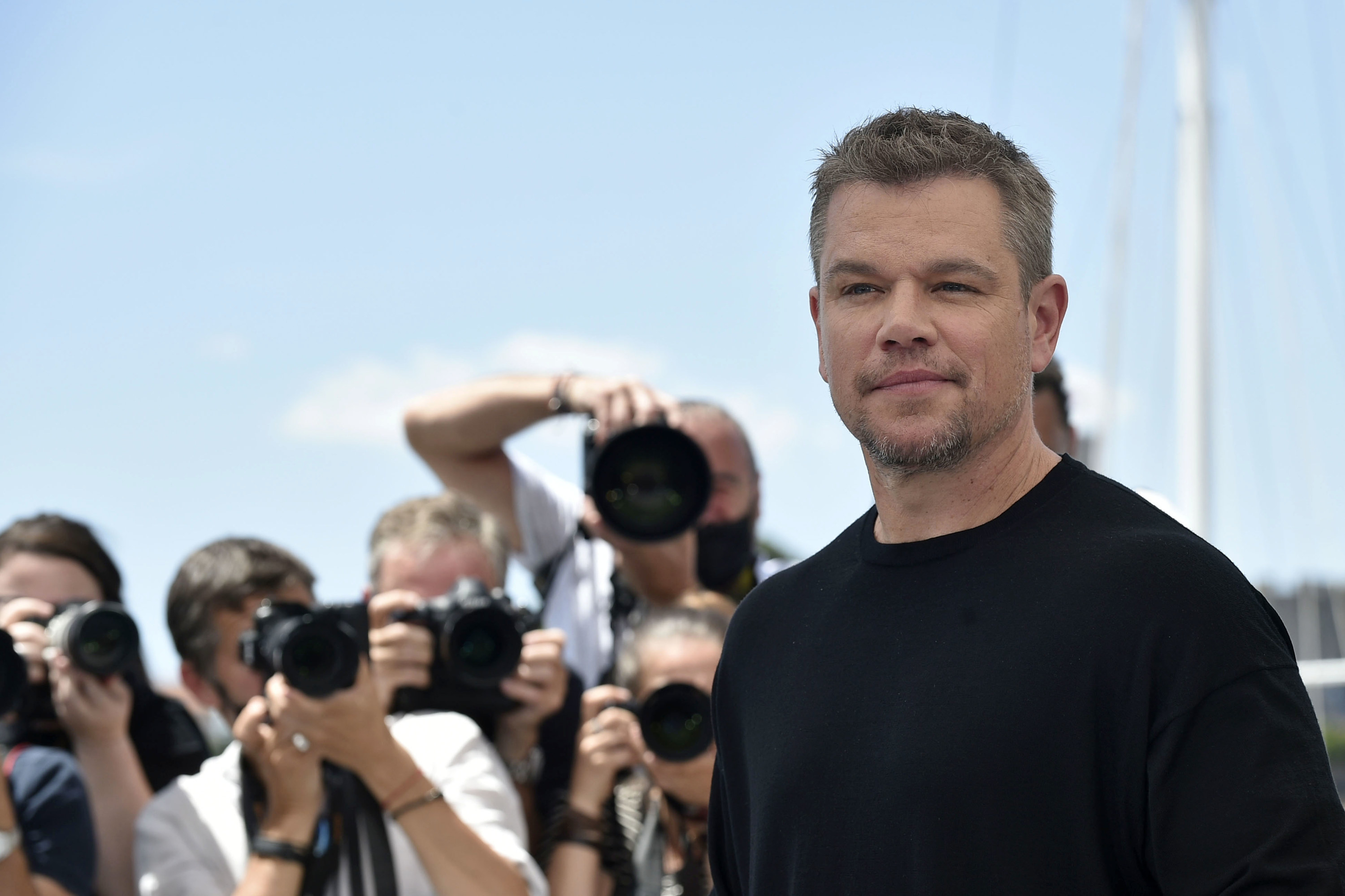 Matt Damon being photographed