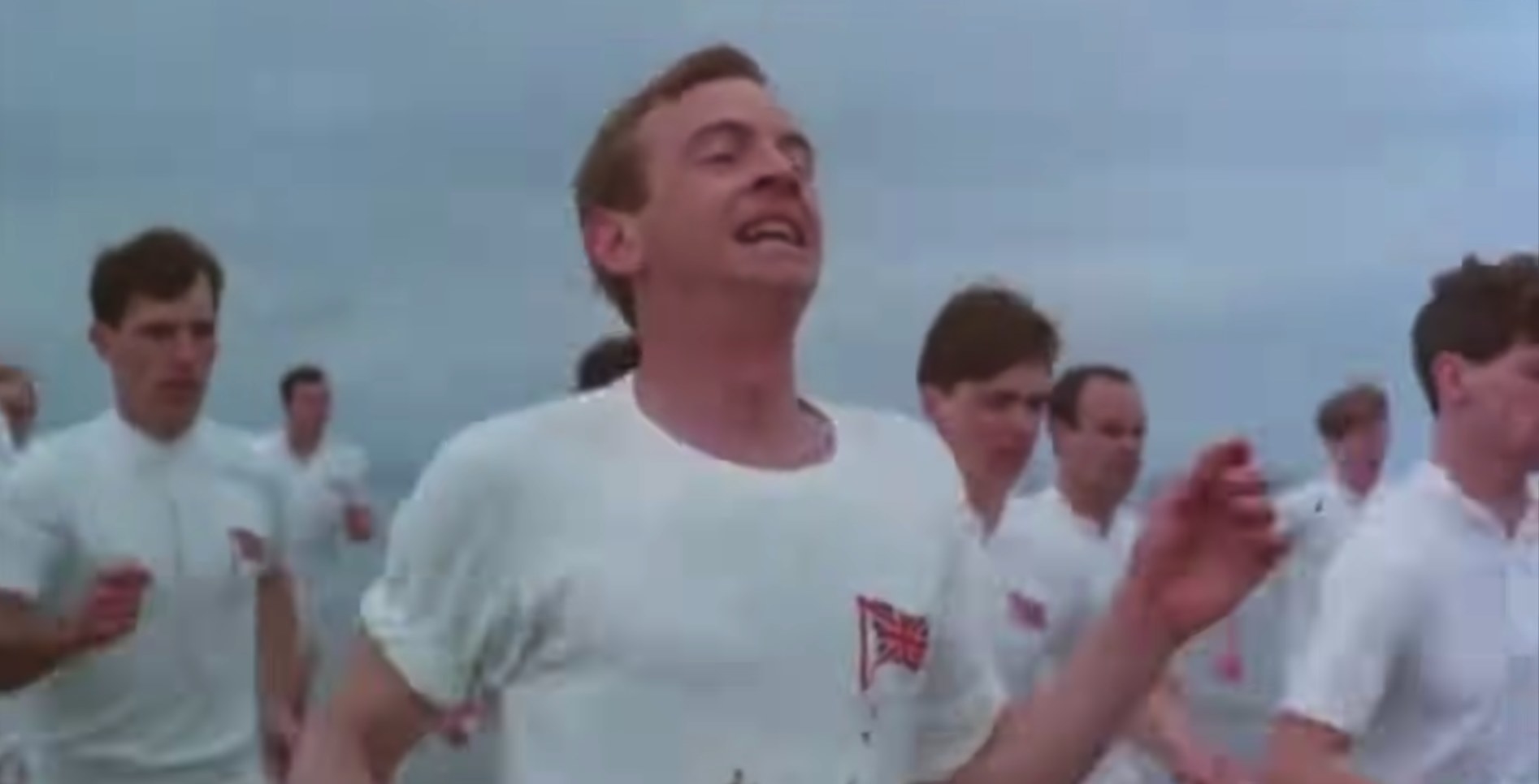 Men wearing white run across a beach in &quot;Chariots of Fire&quot;