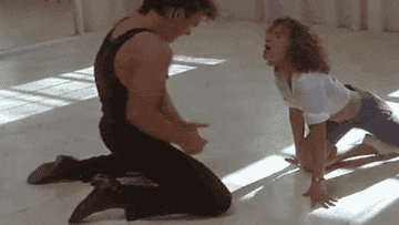 Patrick Swayze and Jennifer Grey dance in a studio in &quot;Dirty Dancing&quot;