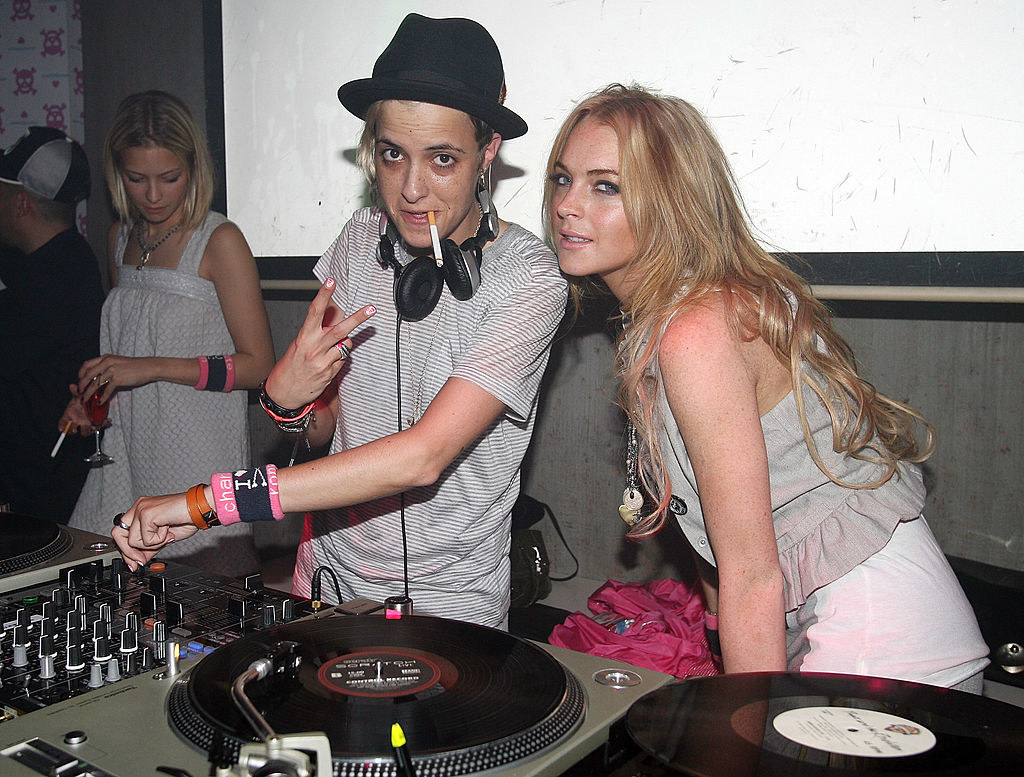 Lindsey posing with Samantha as she DJs