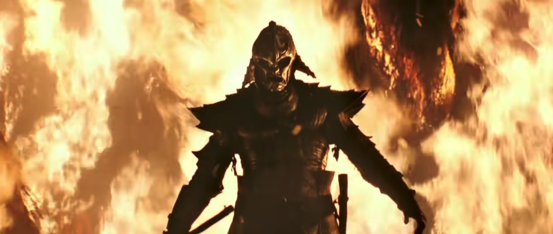 An armored figure walks out of the flames in &quot;47 Ronin&quot;