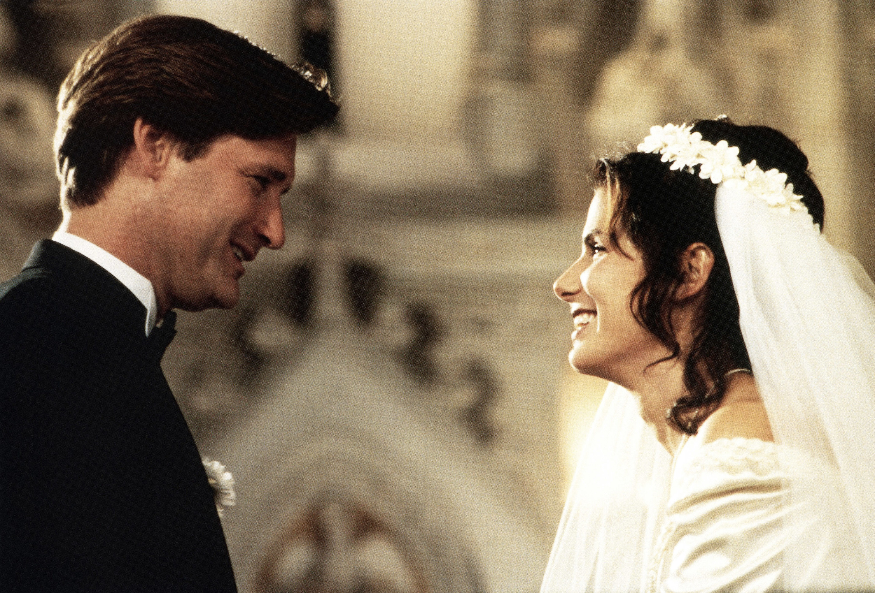WHILE YOU WERE SLEEPING, from left: Bill Pullman, Sandra Bullock, 1995